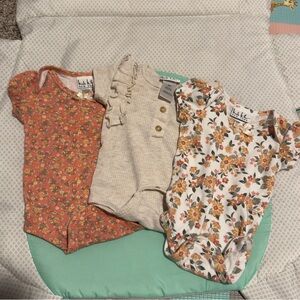 Nicole Miller Floral and Neutral Bodysuits Set